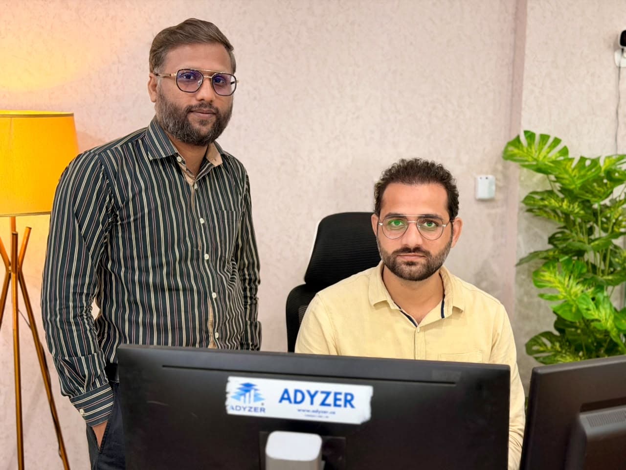 Two ADYZER team members in the office
